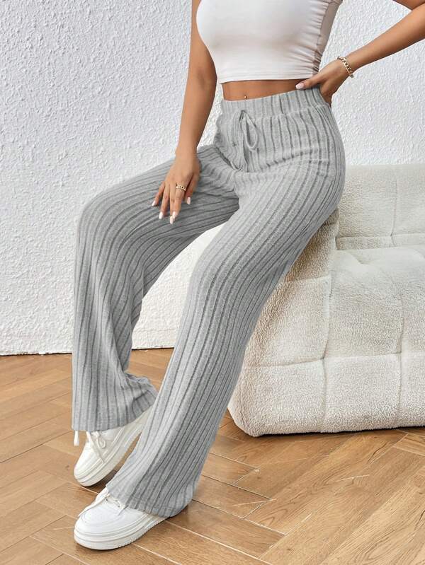 Striped knitted trousers knotted at waist Striped knitted trousers knotted at waist
