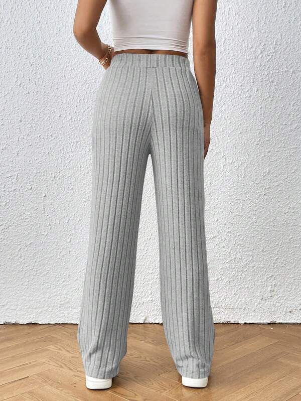 Striped knitted trousers knotted at waist
